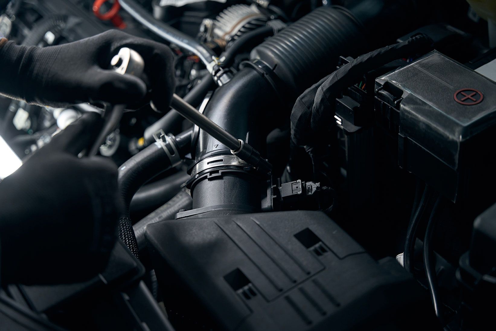 man-conducts-full-technical-inspection-of-auto