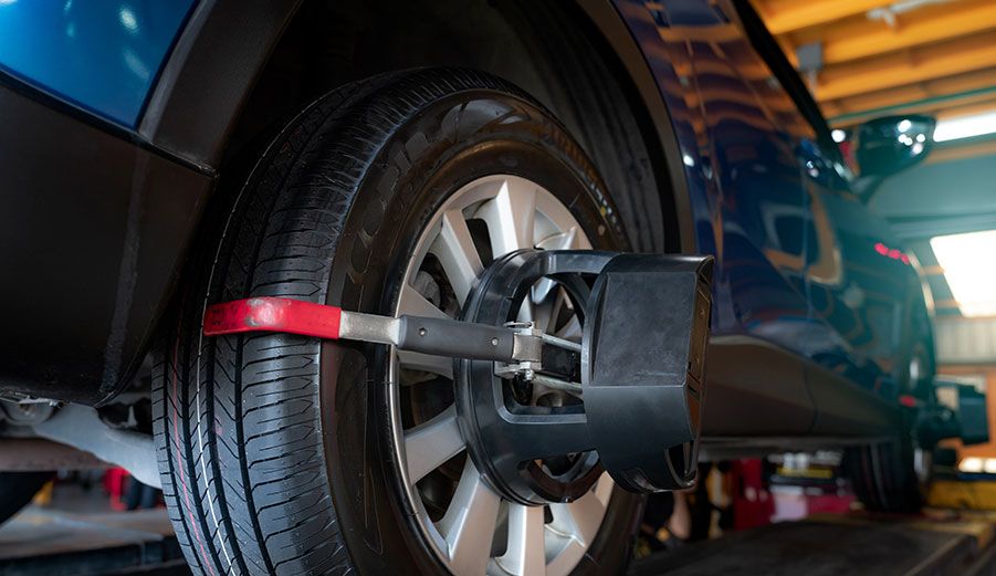 wheel-alignment-equipment-grip-the-tire-of-car